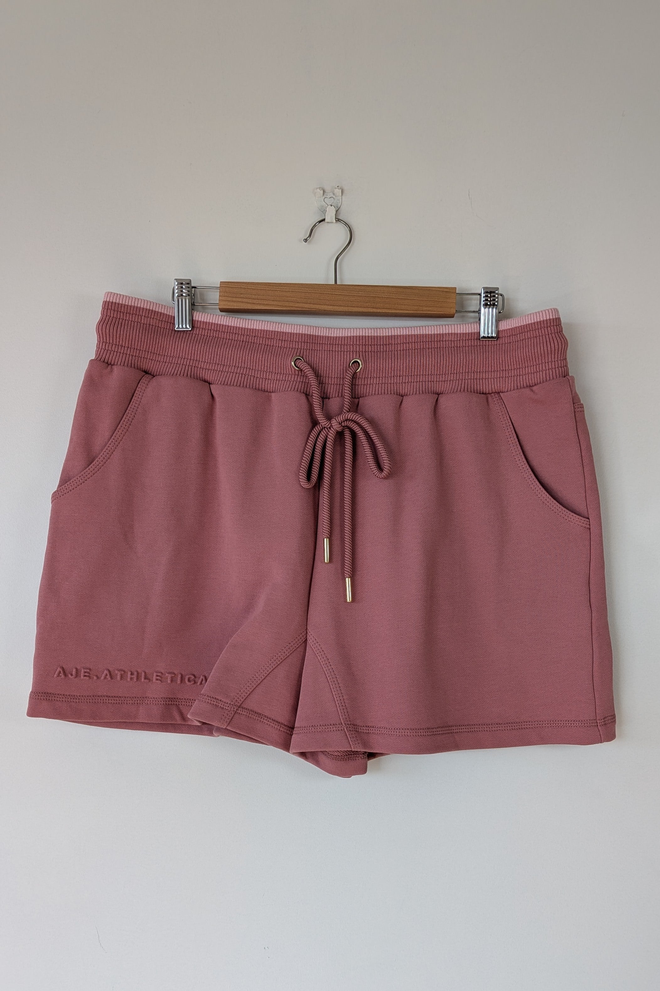 Aje Athletica Signature Logo Sweat Shorts in Rose Quartz Size 16 BNWT RRP $115