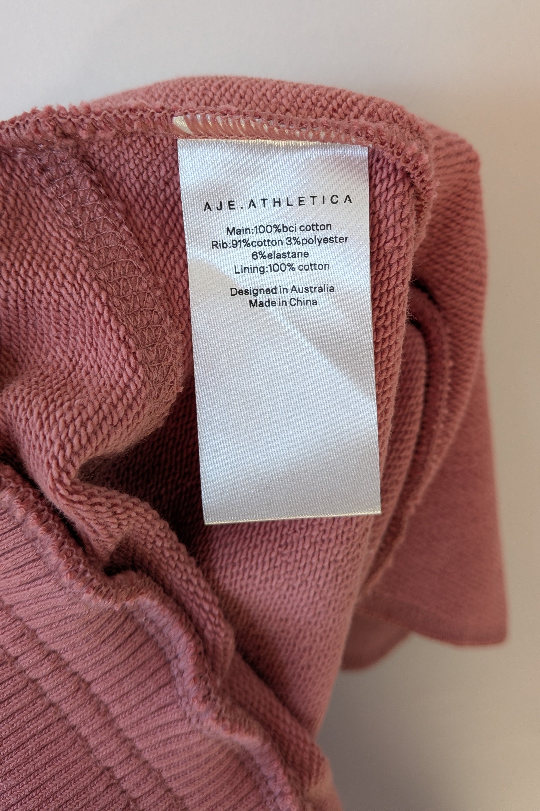 Aje Athletica Signature Logo Sweat Shorts in Rose Quartz Size 16 BNWT RRP $115
