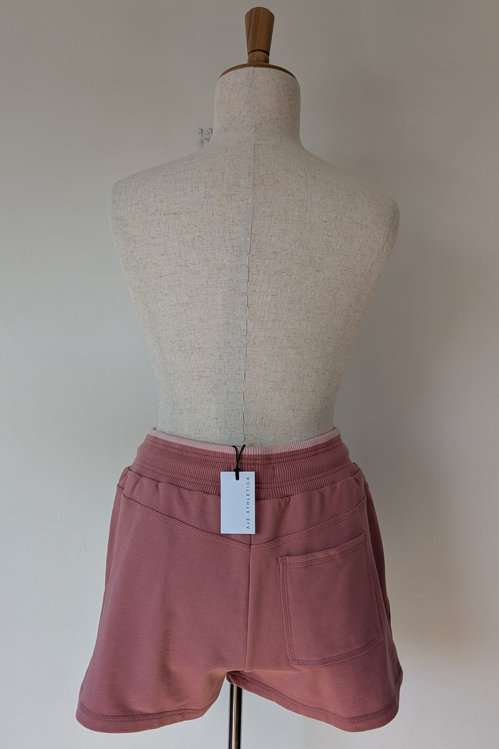 Aje Athletica Signature Logo Sweat Shorts in Rose Quartz Size 16 BNWT RRP $115