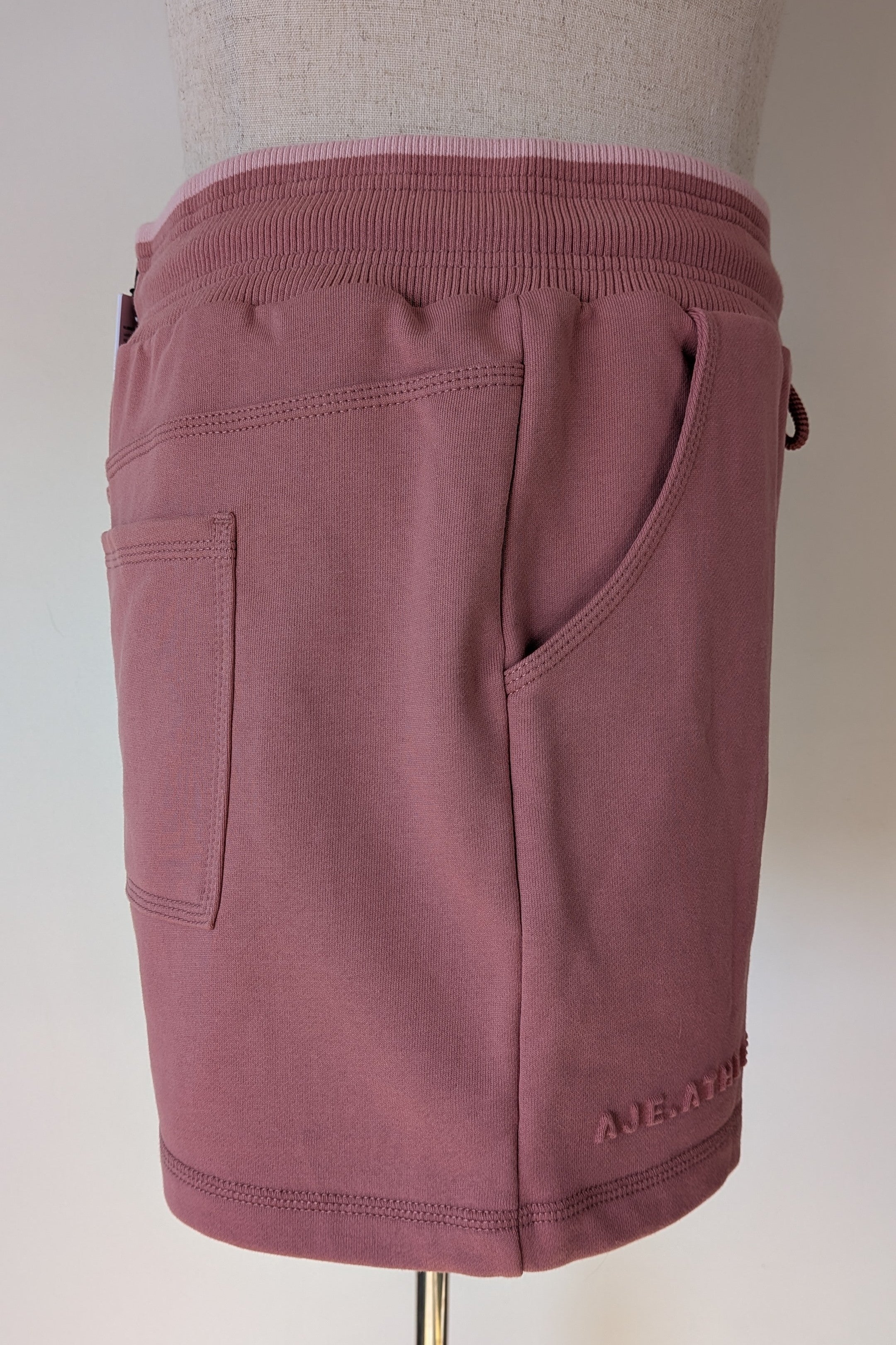 Aje Athletica Signature Logo Sweat Shorts in Rose Quartz Size 16 BNWT RRP $115
